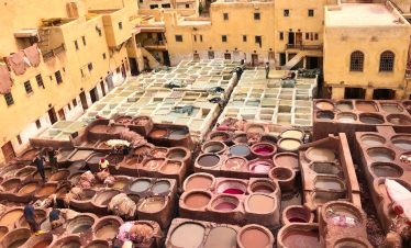 a group of clay pots sitting on top of a roof