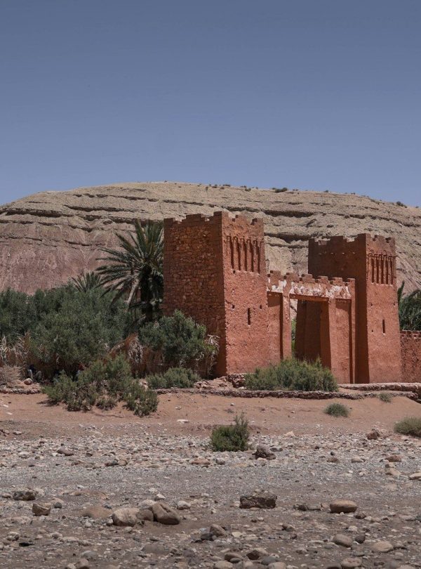 a couple of people that are standing in the dirt