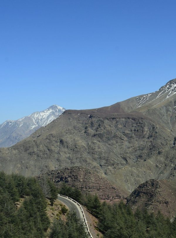a view of a mountain with a road going through it