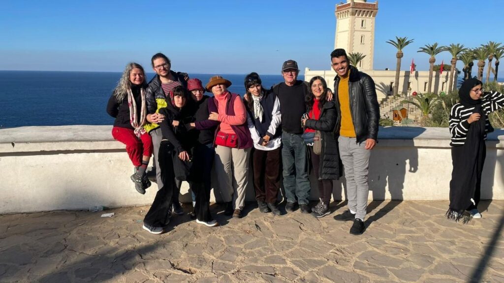 Itinerary Morocco Tours guests with their guide at Cap Spartel lighthouse, Tangier